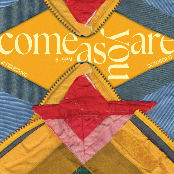 Close-up of a fabric quilt with a star pattern made of various colored fabrics, including yellow, red, pink, blue, and green, with visible stitching and zipper details.