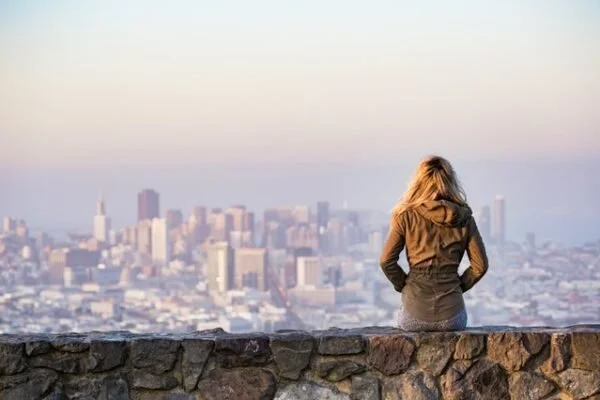 Woman Staring at the City