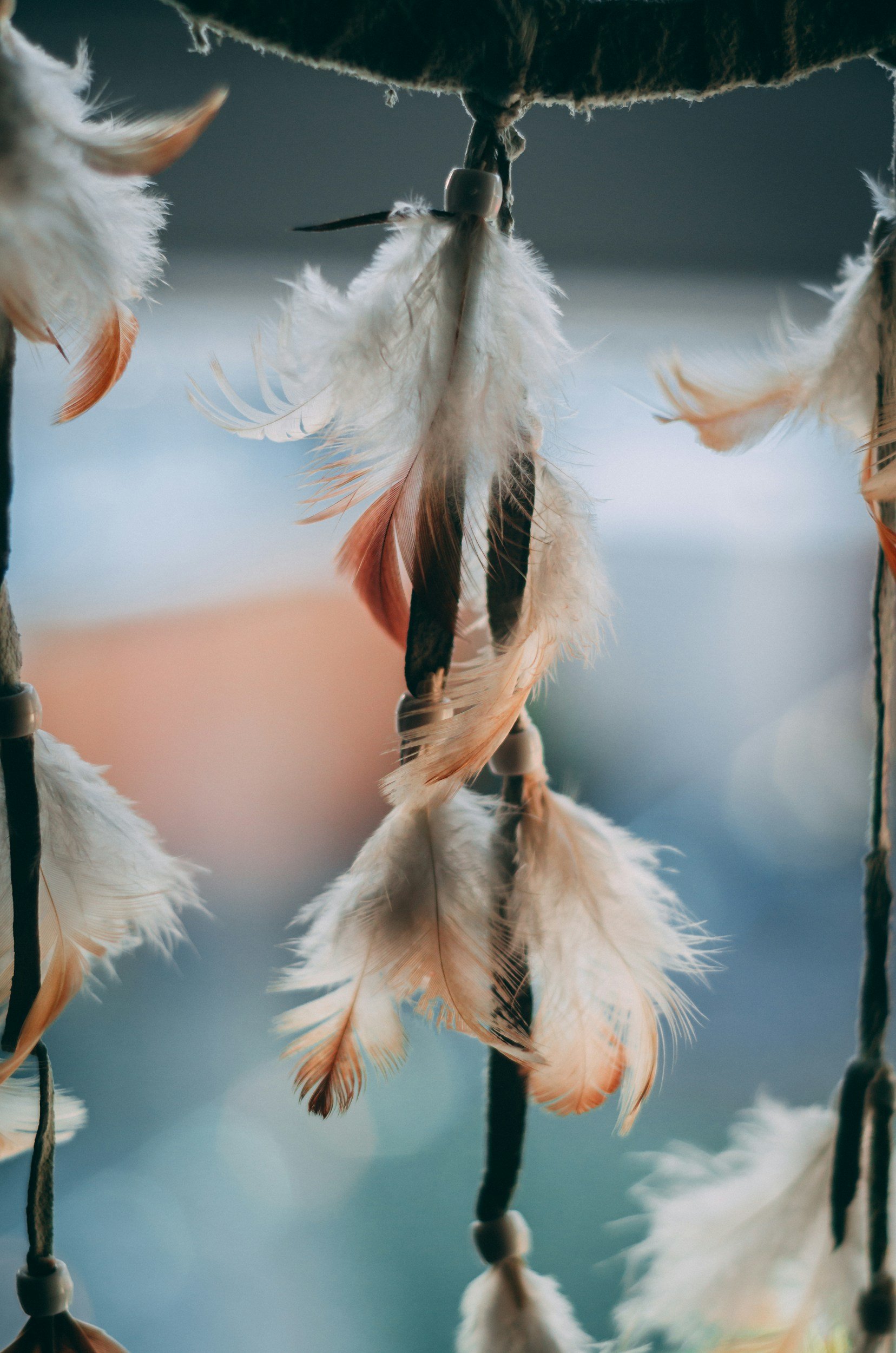feathers hanging off a dreamcatcher | decolonized therapy in pittsburgh | decolonized therapy in philadelphia