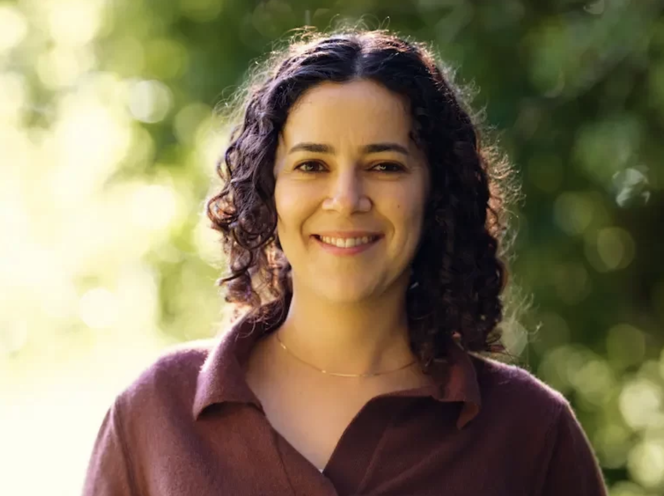 an image of Emma Hassall smiling at the camera