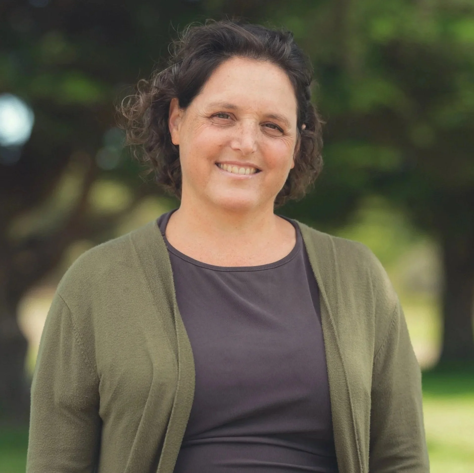 an image of Sarah Weidman smiling at the camera