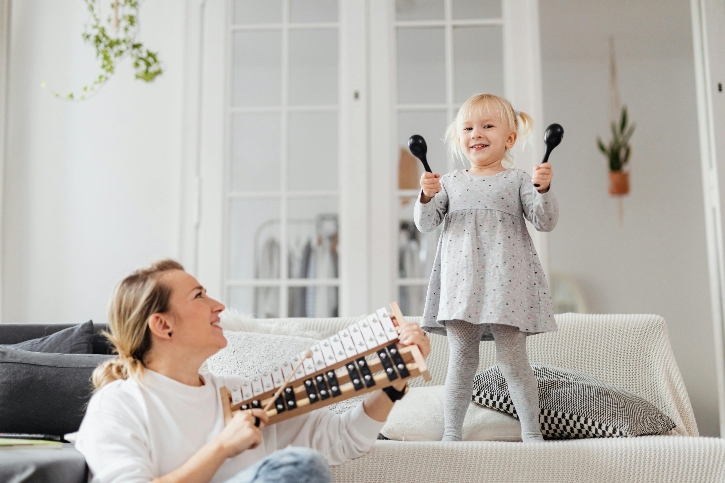 parent and child with musical instrument