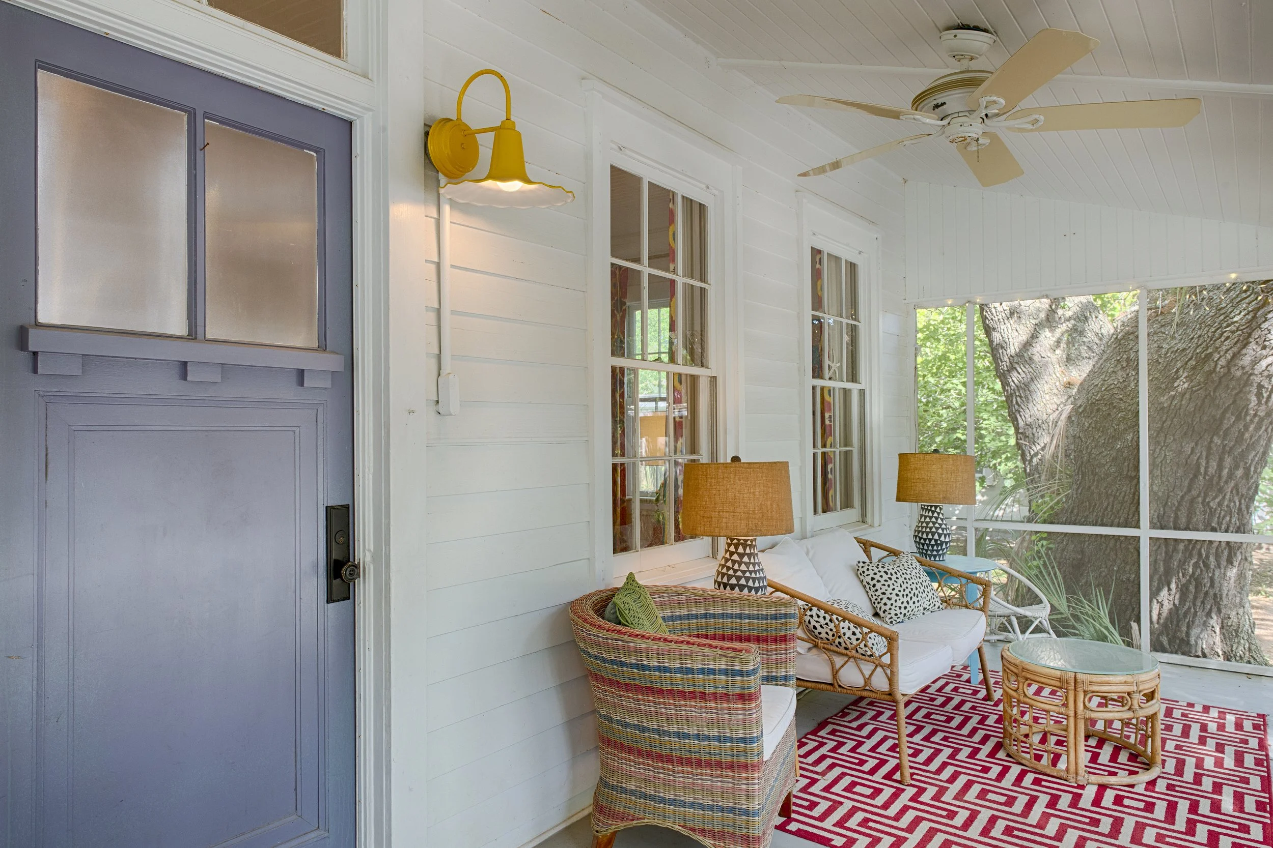 Front door of Bliss Cottage on Tybee Island, showing the self check-in entry with keyless access.