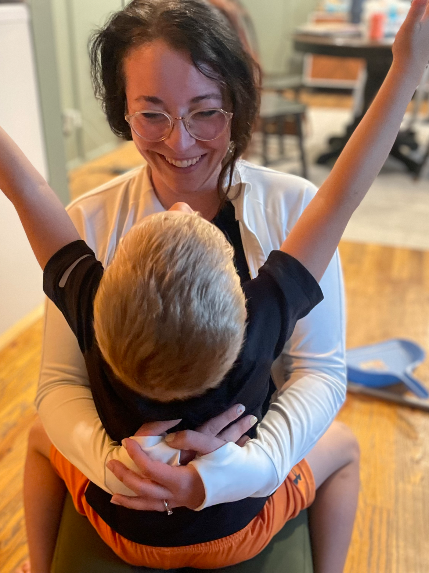 Mom worshipping with son during family worship time