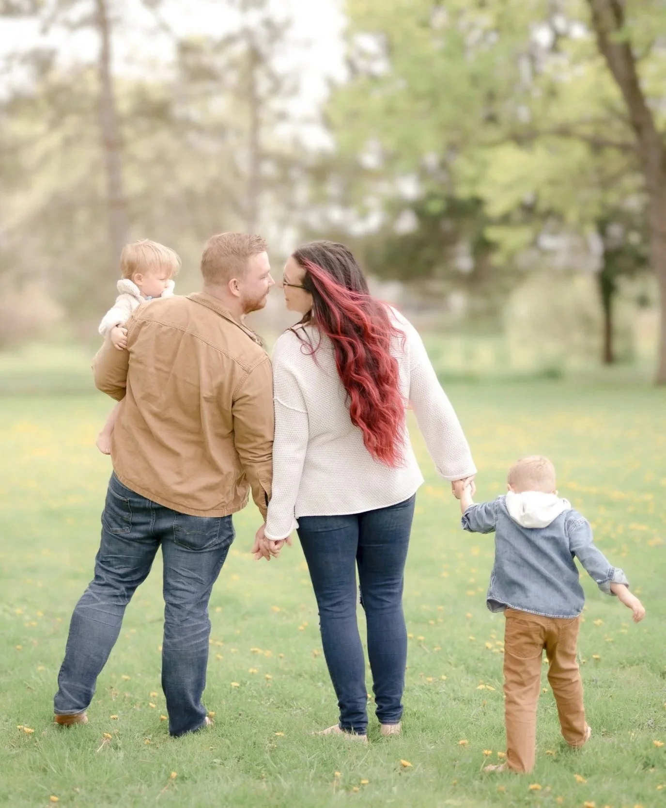 Family with young children in a calm and peaceful home—contact Heartstrings & Hymns for faith-filled home rhythms and worship in everyday life