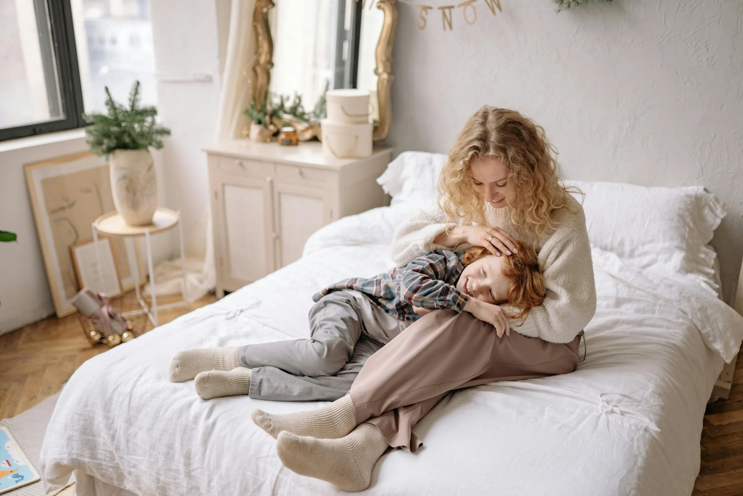 Mom and child reconnecting after big emotions