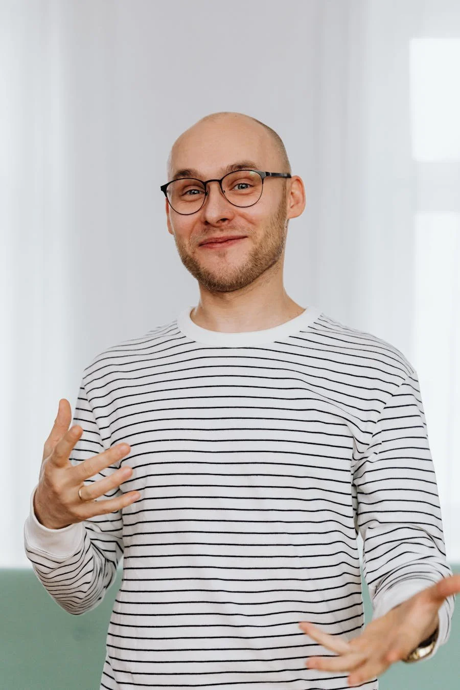 smiling-man-in-his-forties-gesturing