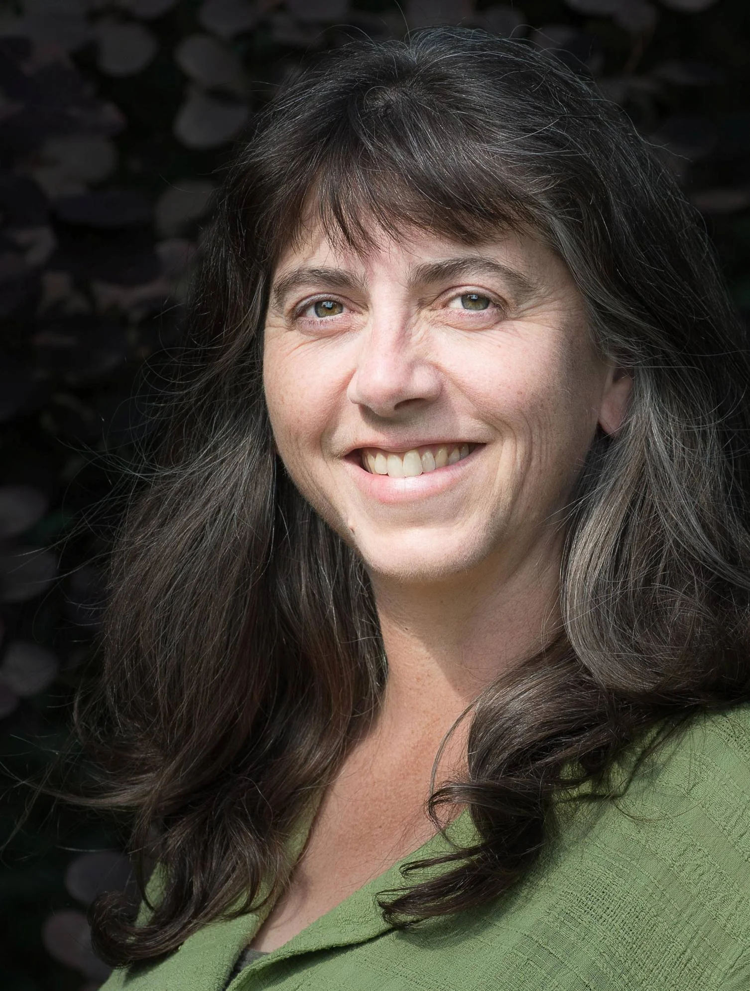 Head shot of Helen Watkins looking straight to camera and smiling