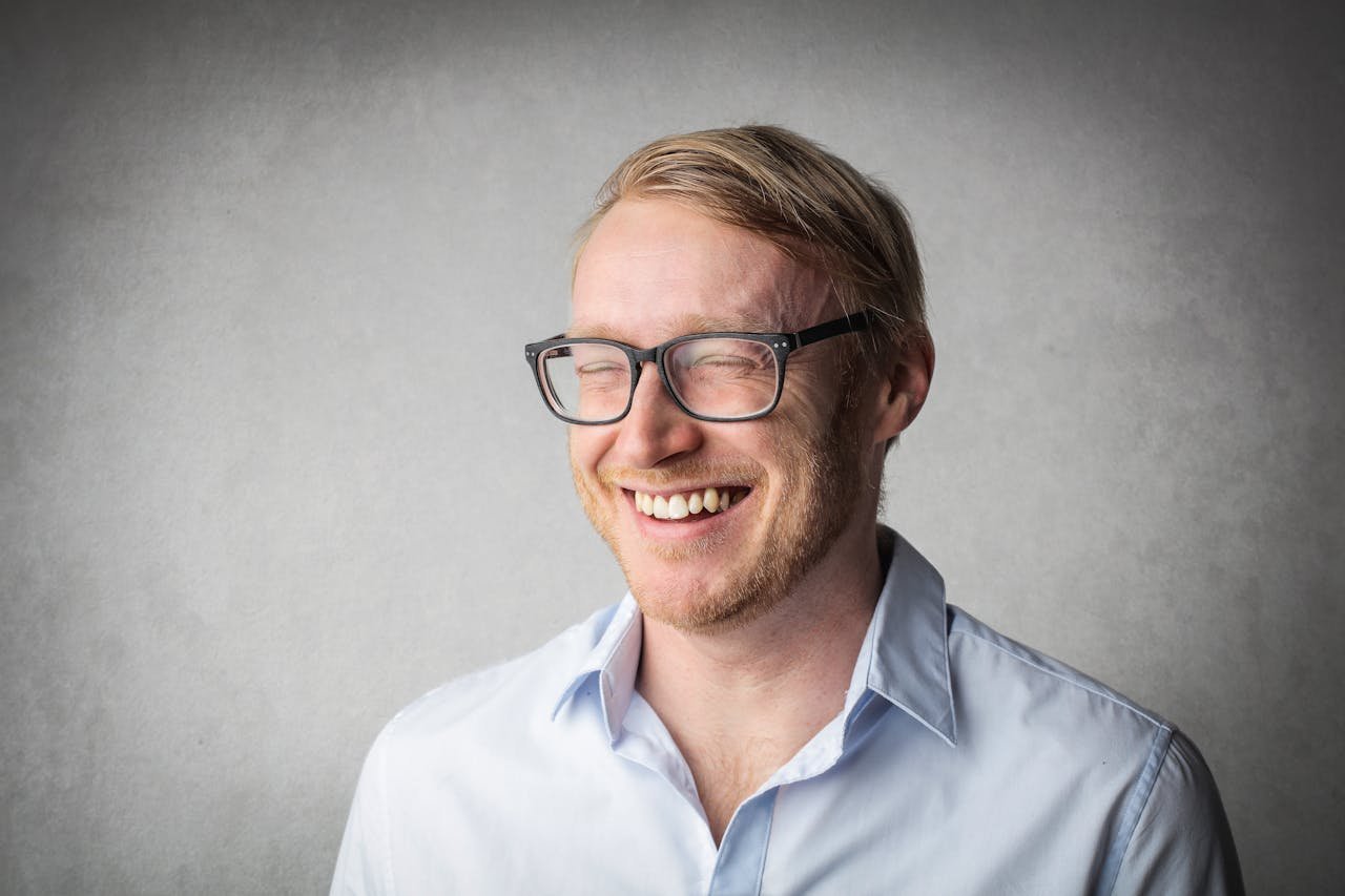 Man with his eyes closed looking relieved