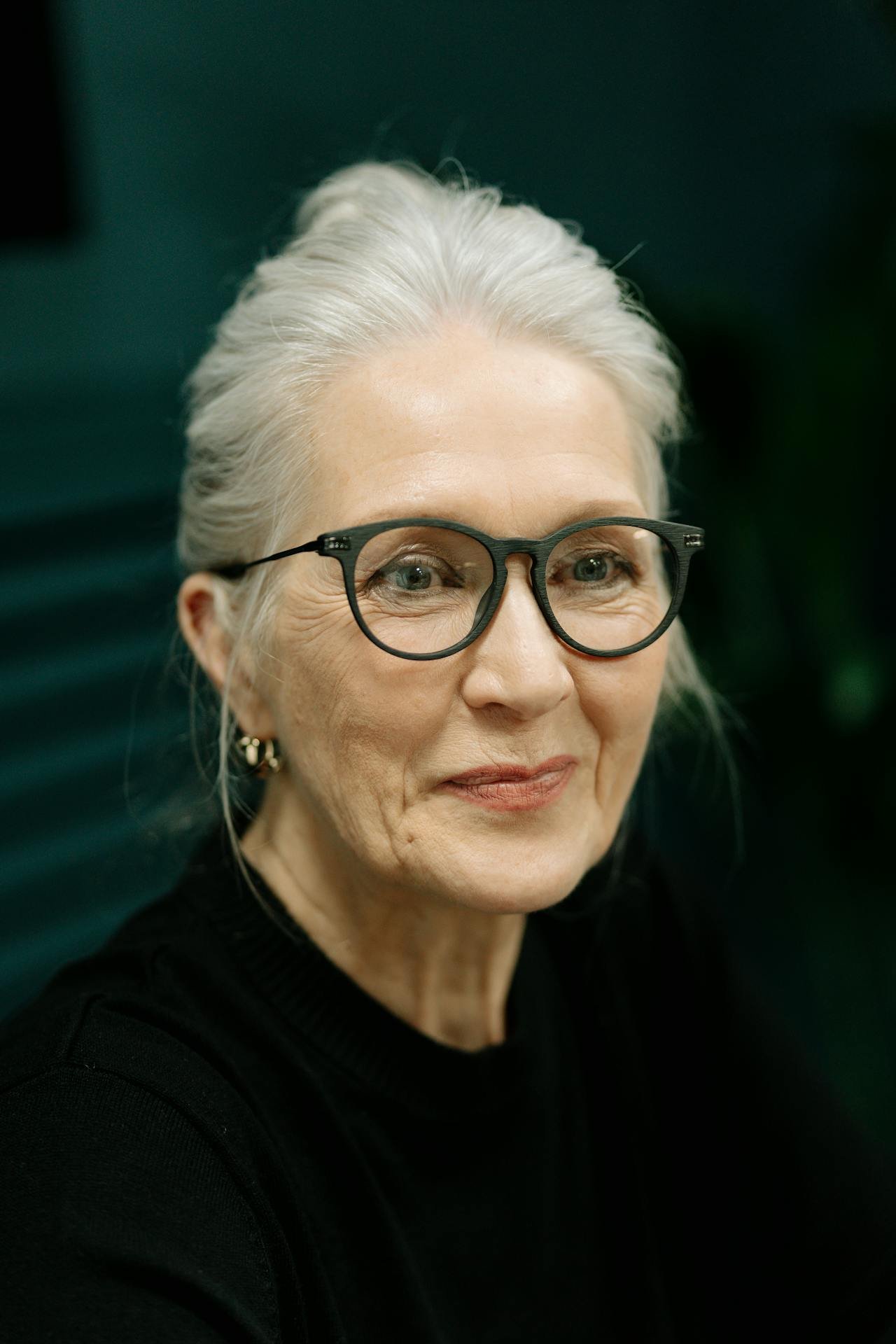 Older woman looking reflective