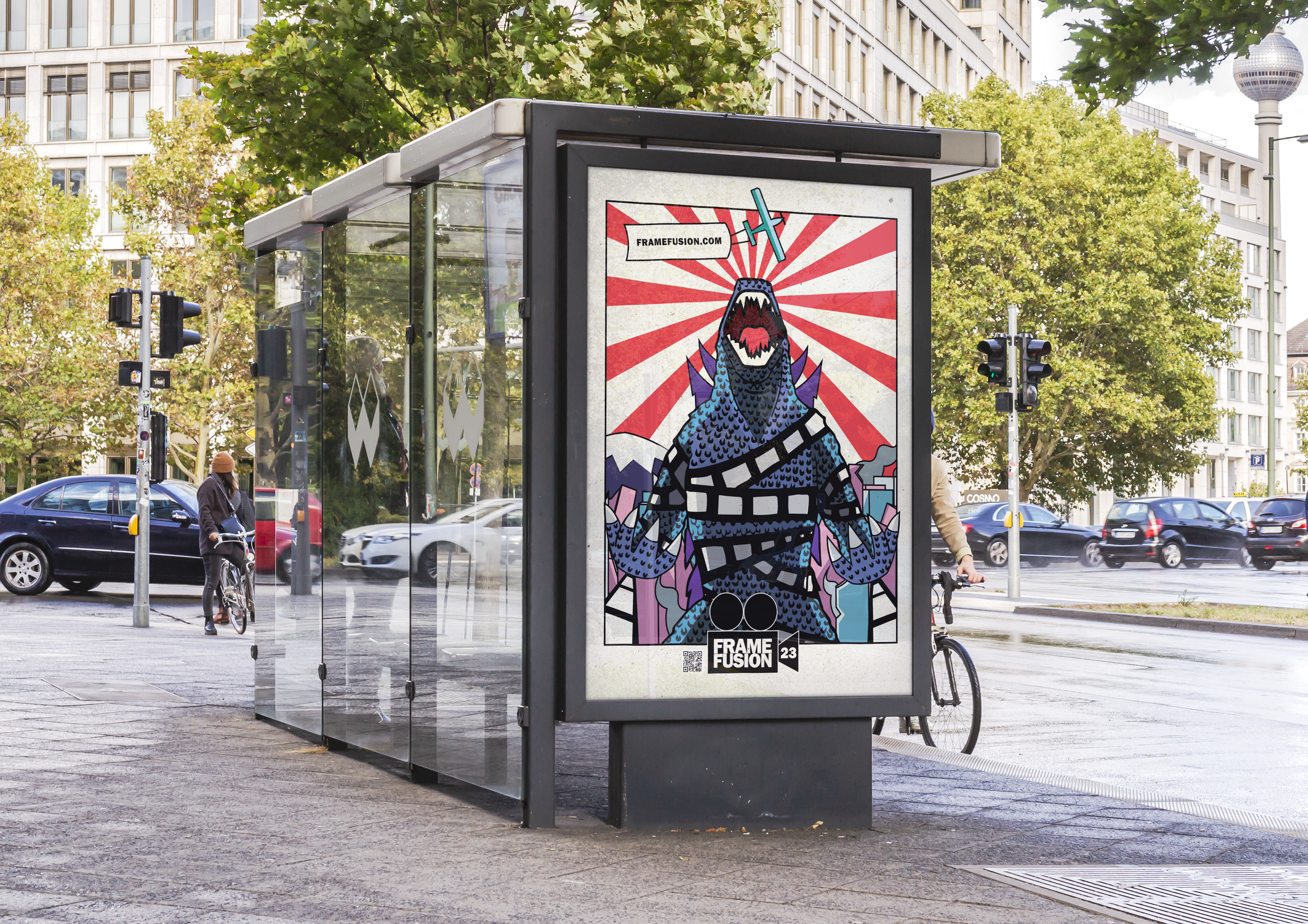 Street scene with a bus shelter displaying a colorful, cartoon-style poster of a monster with dragon features, set against a red and white sunburst background, with trees, cars, and pedestrians in the background.