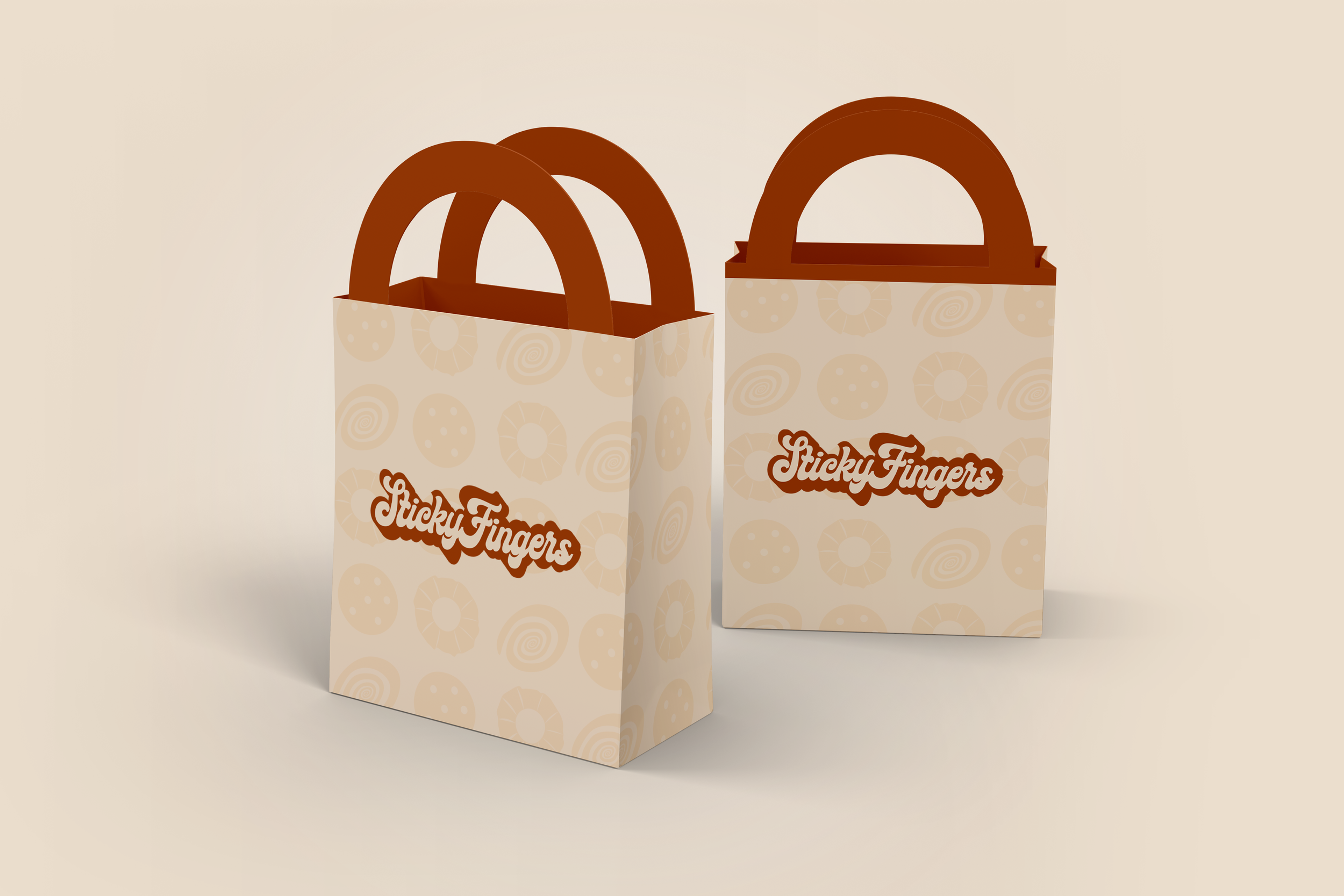 Two paper bags with red handles and a beige background pattern of cookies and swirls, bearing the logo 'Sticky Fingers' in brown cursive text.
