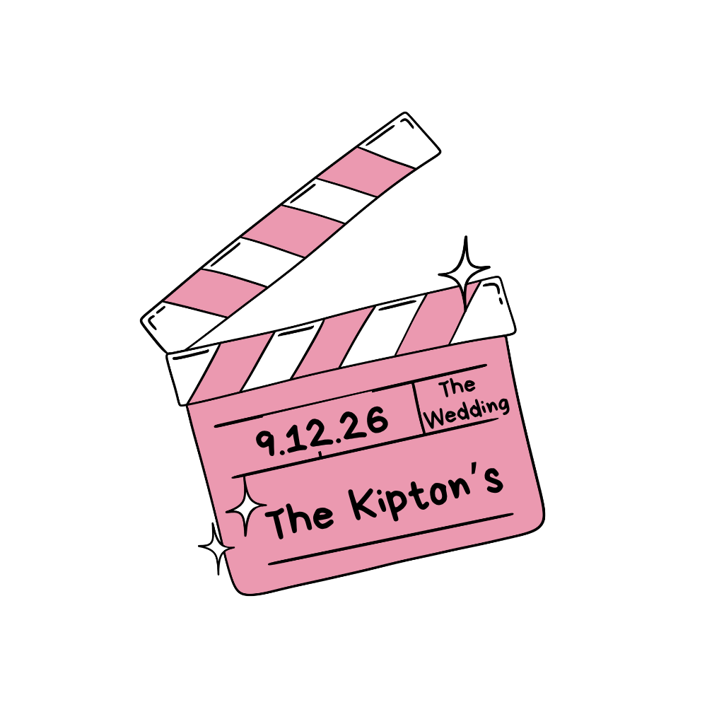 A cartoon-style pink and white clapperboard with the date 9.12.26, the words 'The Wedding', and 'The Kipton's' written on it, against a black background.