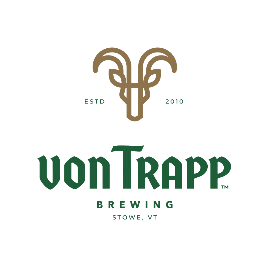 Logo of Von Trapp Brewing featuring a stylized goat head in brown and green text reading 'von Trapp Brewing Stowe, VT,' with 'ESTD 2010' on either side of the goat head.