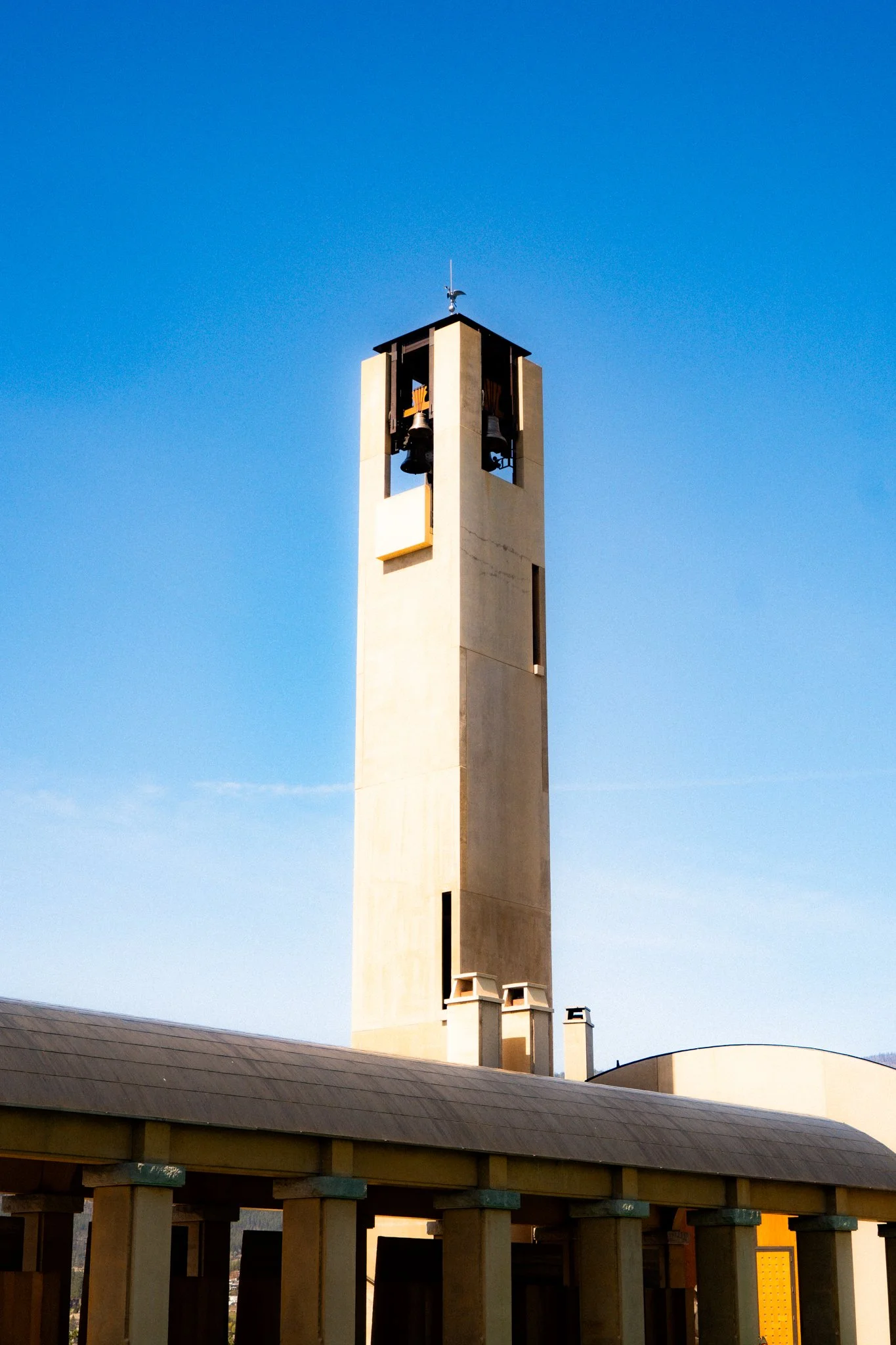 Bell tower against blue sky