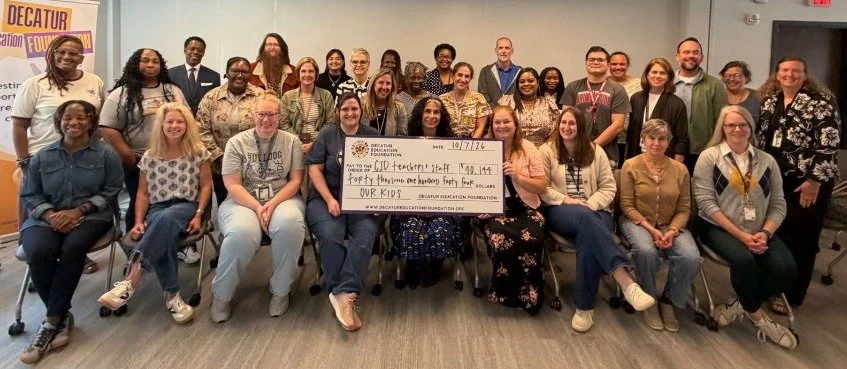 group photo with check.jpeg