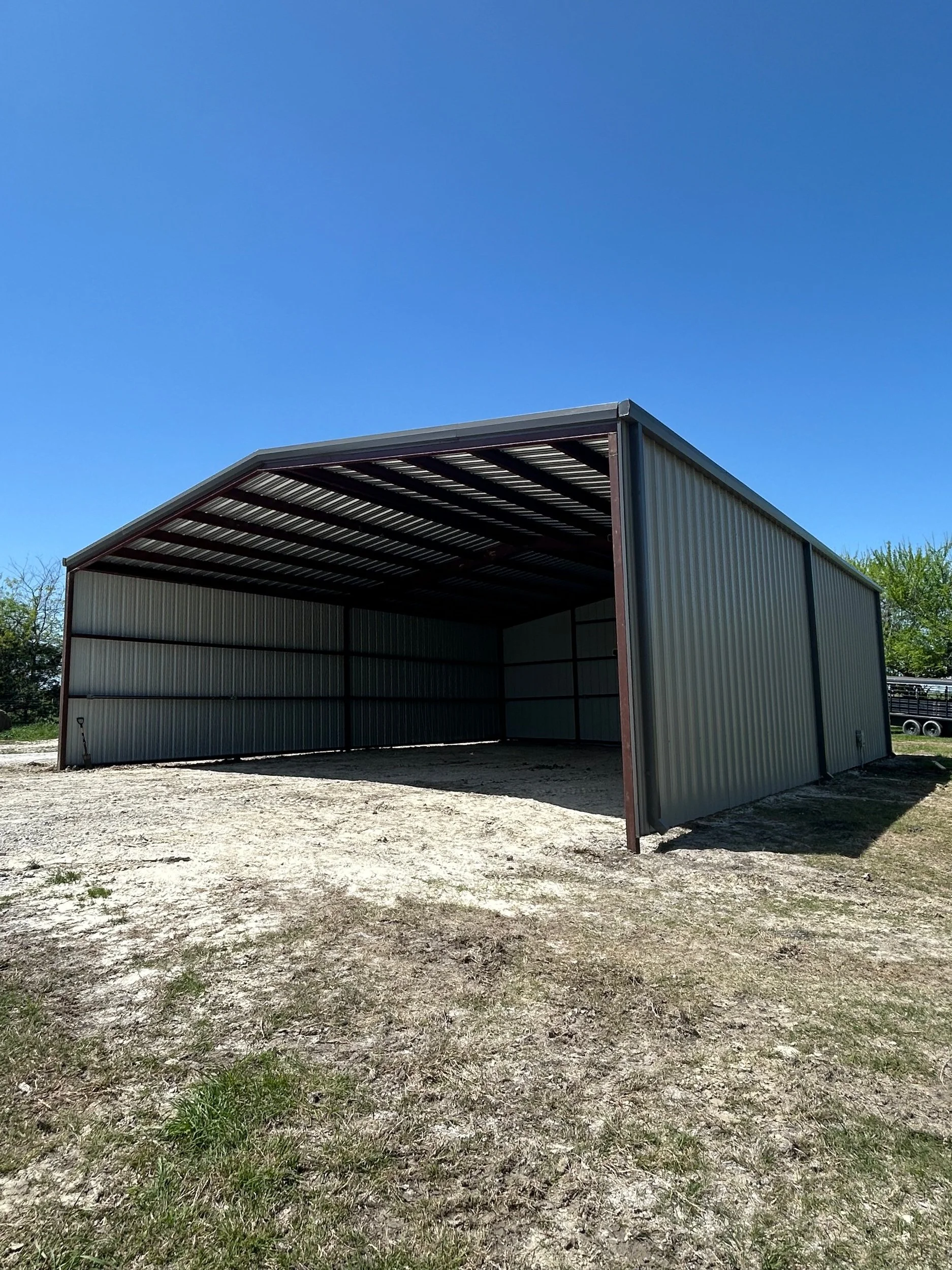 Open-front metal building constructed by Spillers Metal Buildings.