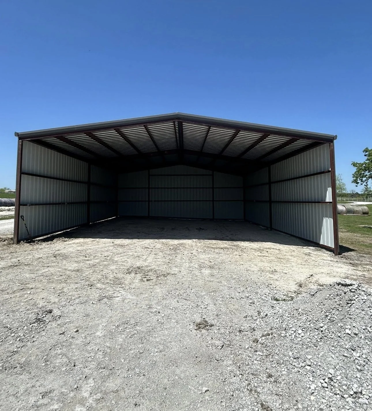 Open-front metal building constructed by Spillers Metal Buildings.