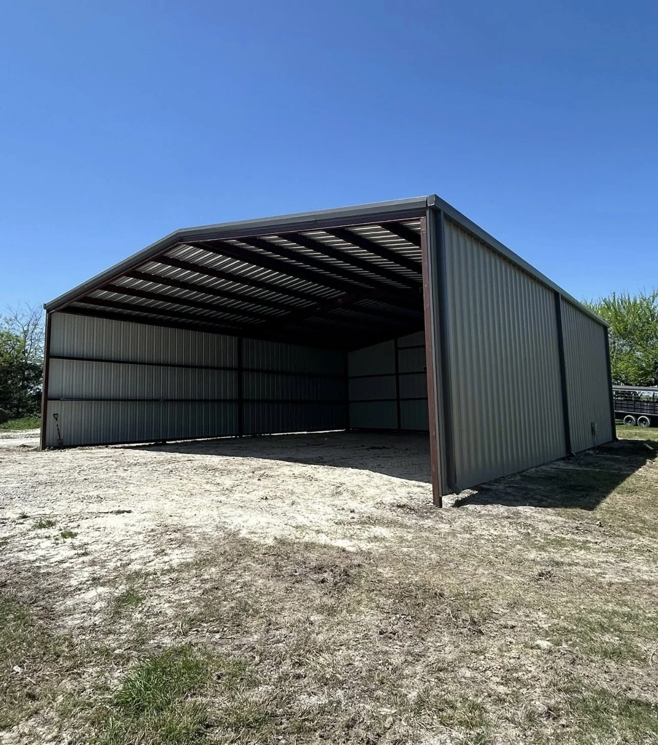 Open-front metal building constructed by Spillers Metal Buildings.