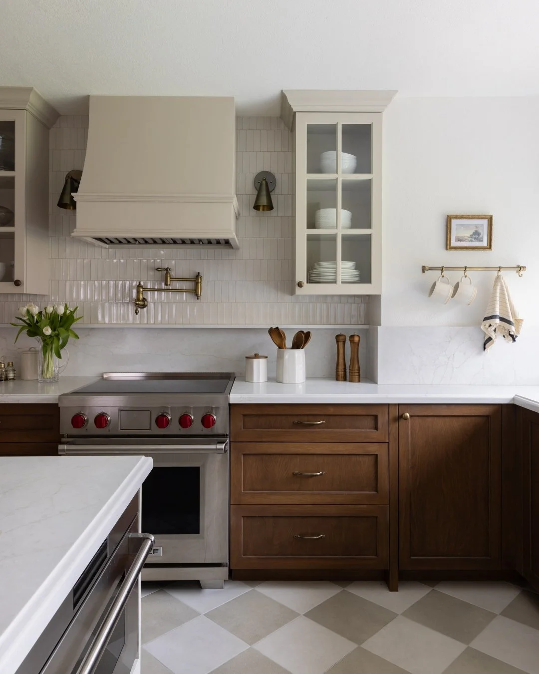 A fun, functional, and dreamy kitchen for our sweet clients.

While the kitchen had a good amount of space, the layout wasn't fully working for their growing family. We reworked it to create better flow, add the storage they truly needed, and select 