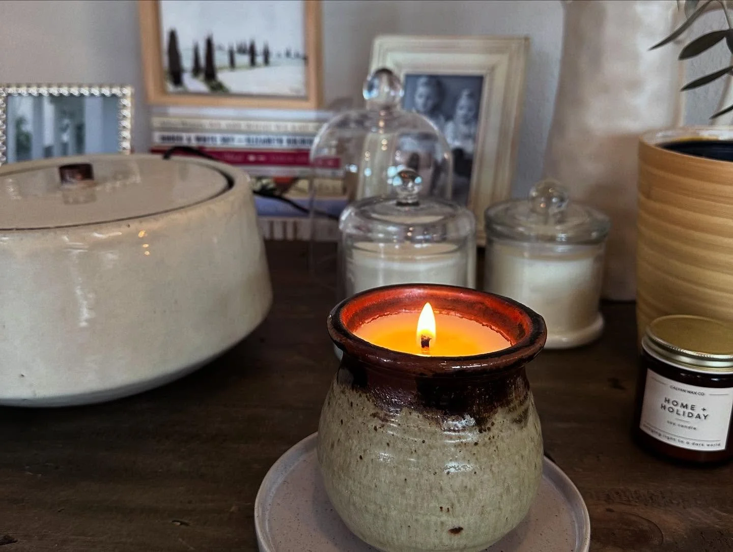 I&rsquo;m always rearranging my tables, usually inspired by a new candle vessel or flowers from my community garden. This vessel is extra special and pretty. My mom made it in the &rsquo;70s when she was in college. I am working on convincing her to 