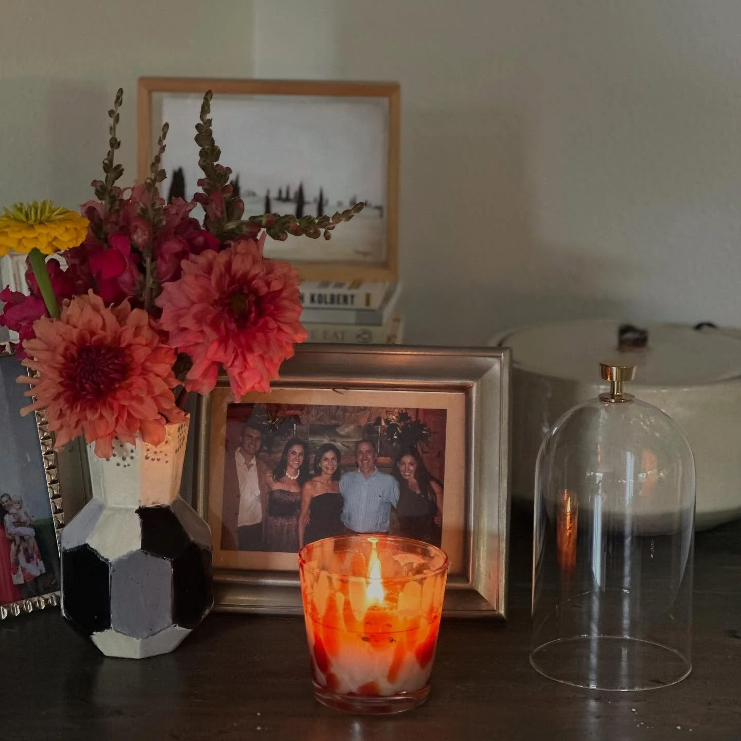 My first garden bouquet of the summer. The dahlias tubers I bought this winter from @_juniperflowers and are soooo pretty. The candle this years Summer Scent. Head to @aspenhive in Aspen or @bloom.yoga.co in Chapel Hill to get your own candle.