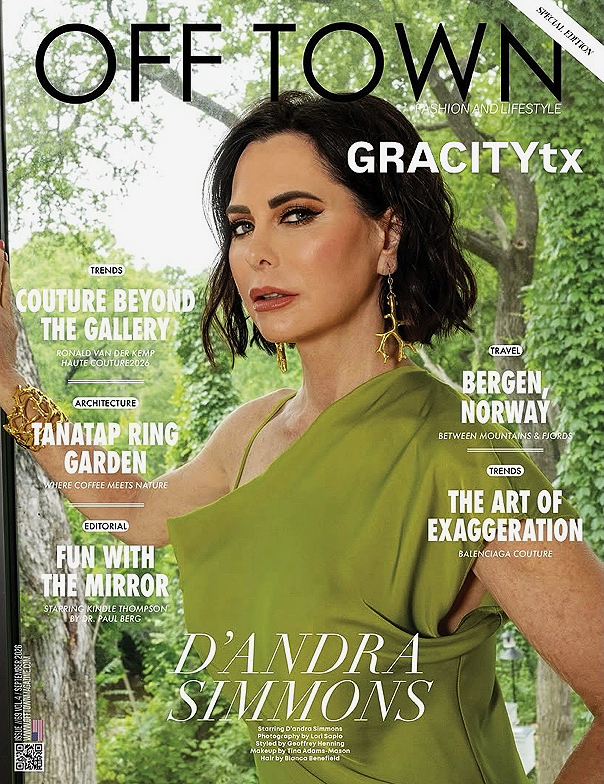 Magazine cover of Off TOWN with D'Andra Simmons in a green dress outdoors. Text includes headlines about fashion, architecture, travel, and editorial topics.