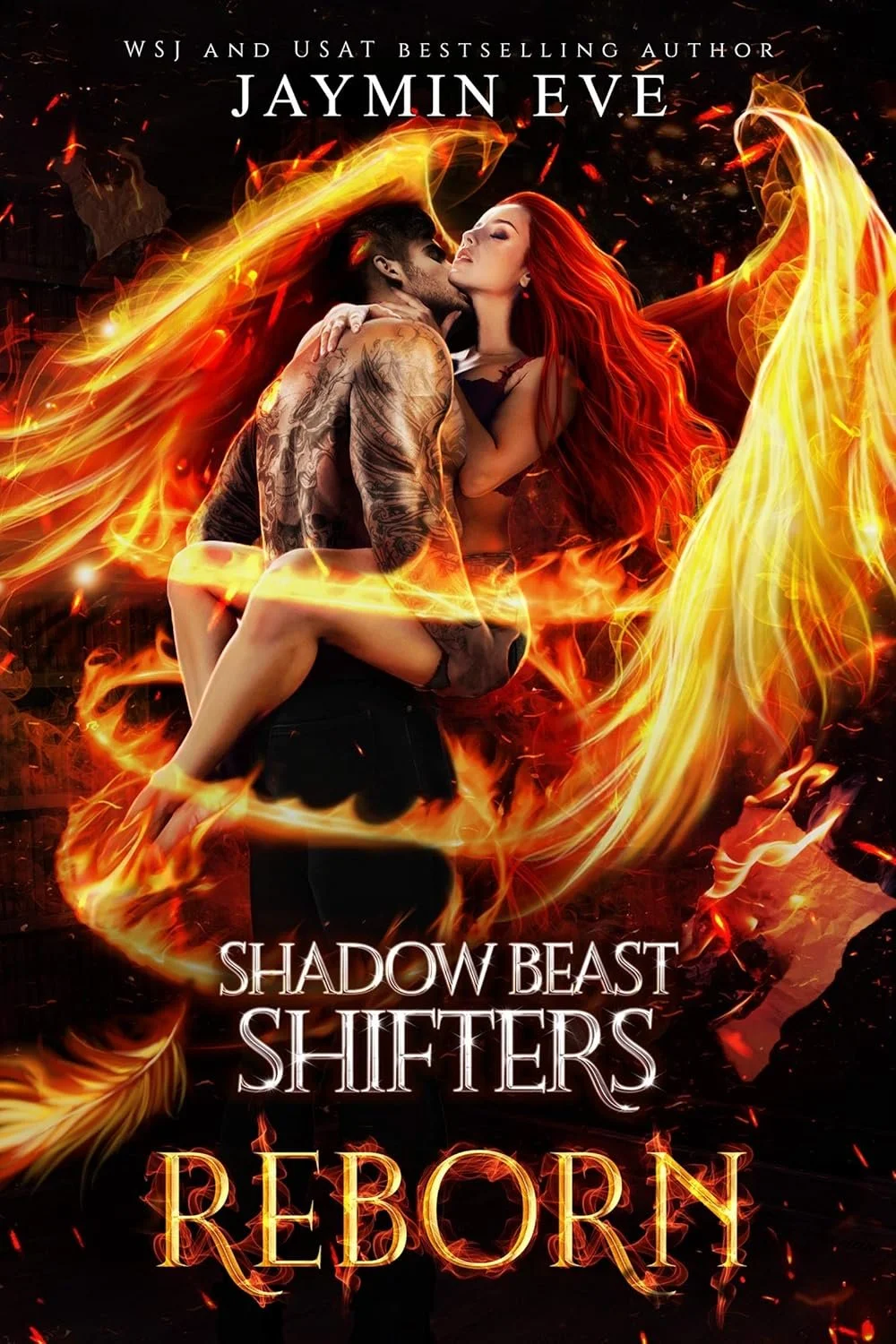 A man with tattoos holding a woman with long red hair amidst swirling flames on a book cover for 'Shadow Beast Shifters: Reborn' by Jaymin Eve.