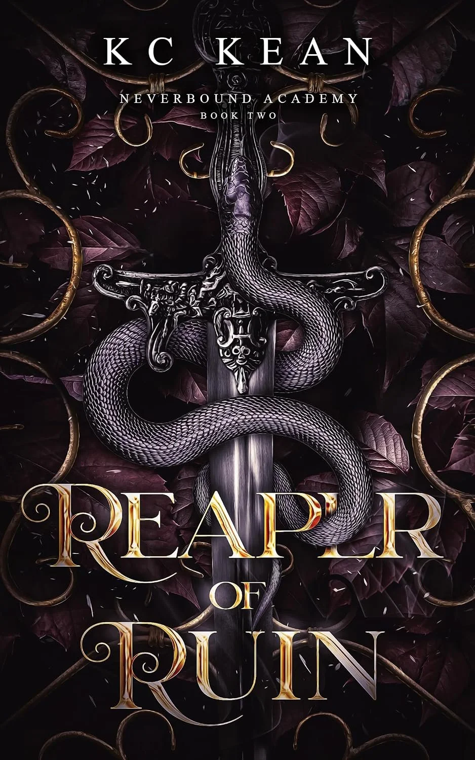 Book cover titled "Reaper of Ruin" by K.C. Kean, featuring a dark, metallic snake coiled around an ornate sword with purple leaves and gold rings in the background.