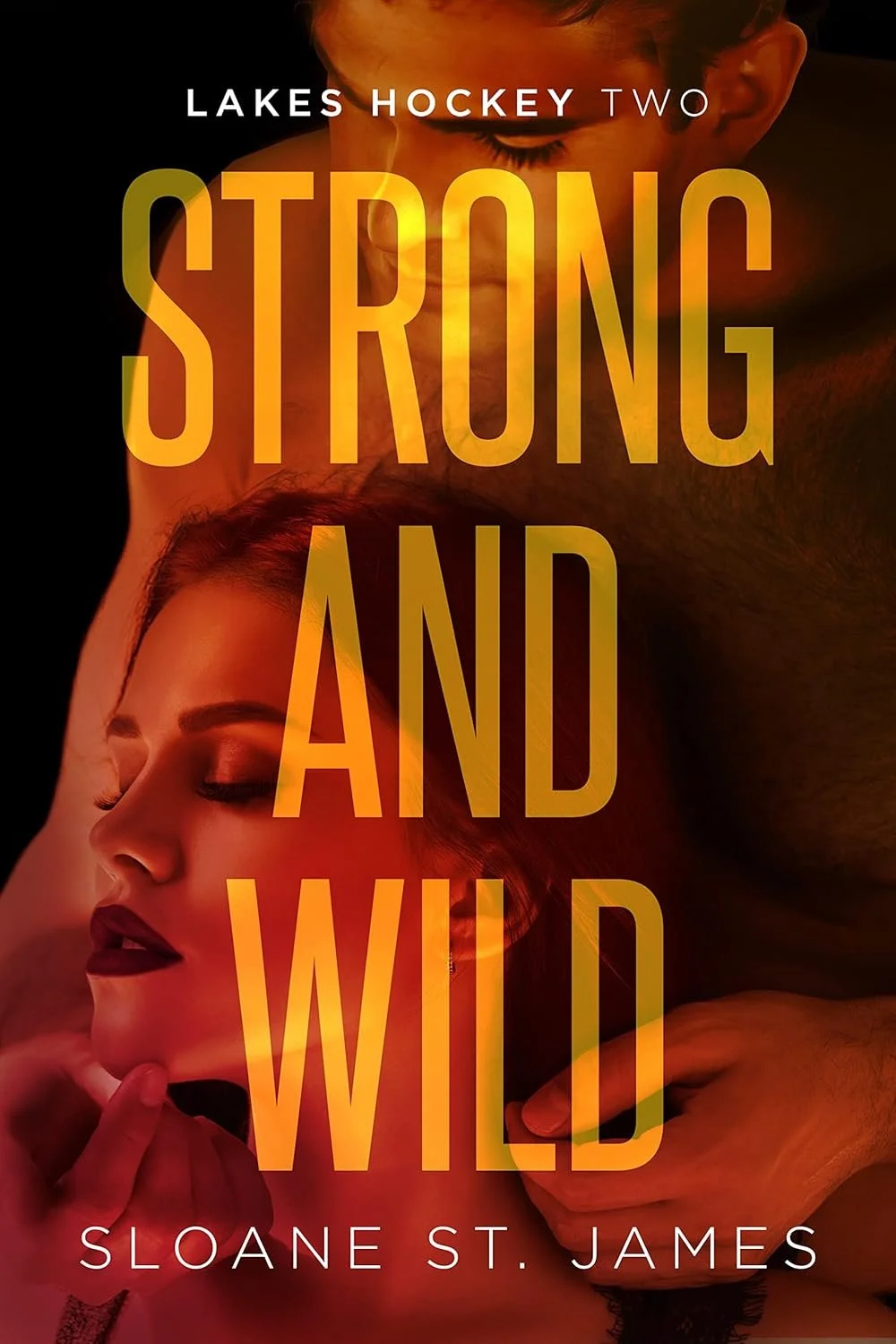 Book cover for 'Lakes Hockey Two: Strong and Wild' by Sloane St. James featuring a shirtless man and a woman with makeup, both with closed eyes, intimate pose, warm lighting, dark background.