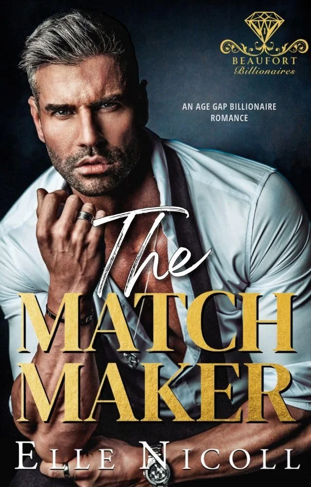 Book cover titled "The Match Maker" by Elle Nicoll, featuring a man with gray hair and beard wearing a white shirt with the top buttons undone, holding his collar with one hand, with a serious expression. The cover has a dark background, gold and white text, and a gold diamond logo with the text "Beaufort Billionaires" and "An Age Gap Billionaire Romance."