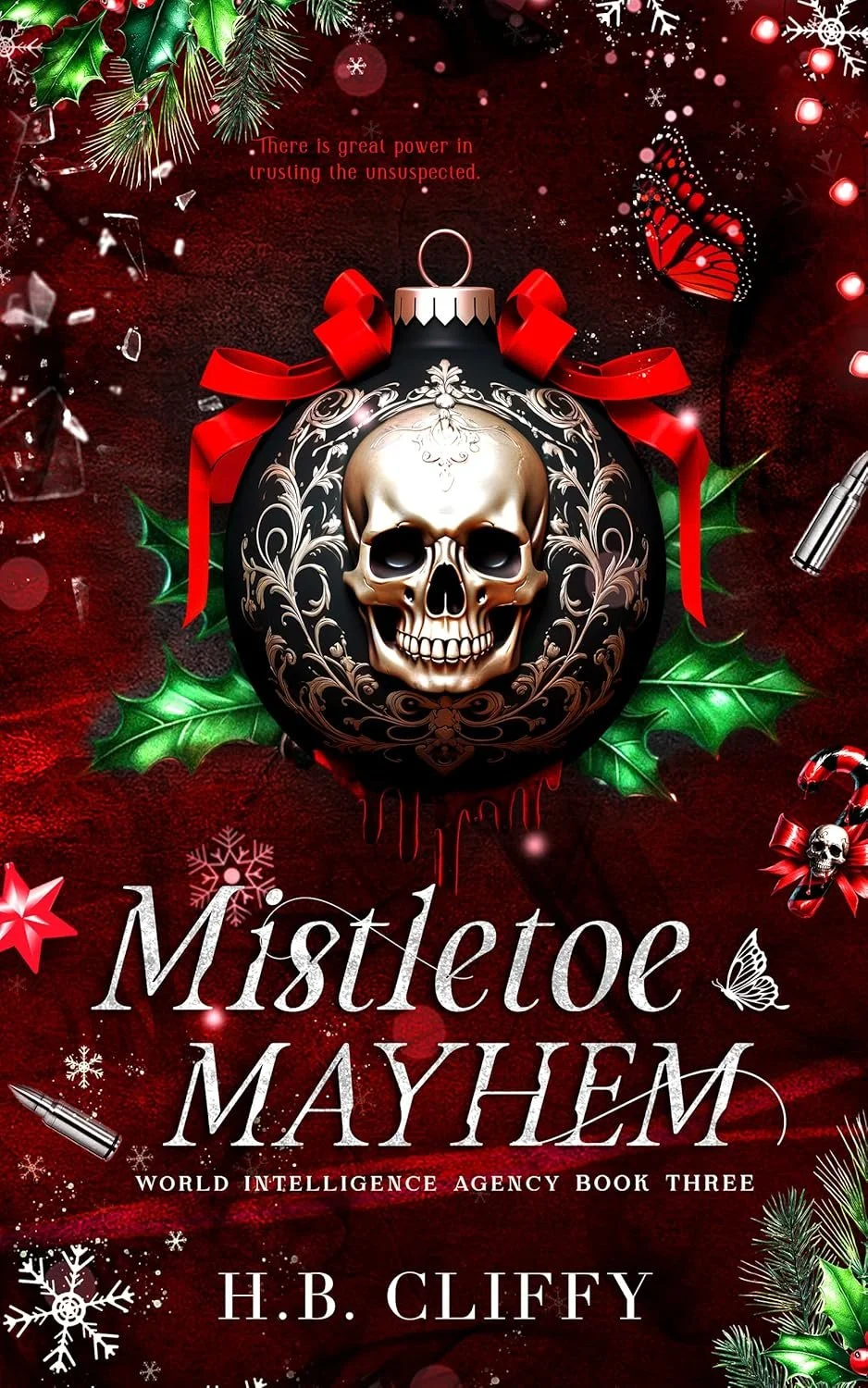 Cover of a book titled "Mistletoe Mayhem" by H. B. Cliffy, featuring a Christmas ornament with a skull design, surrounded by holly leaves, snowflakes, and festive decorations on a red background.