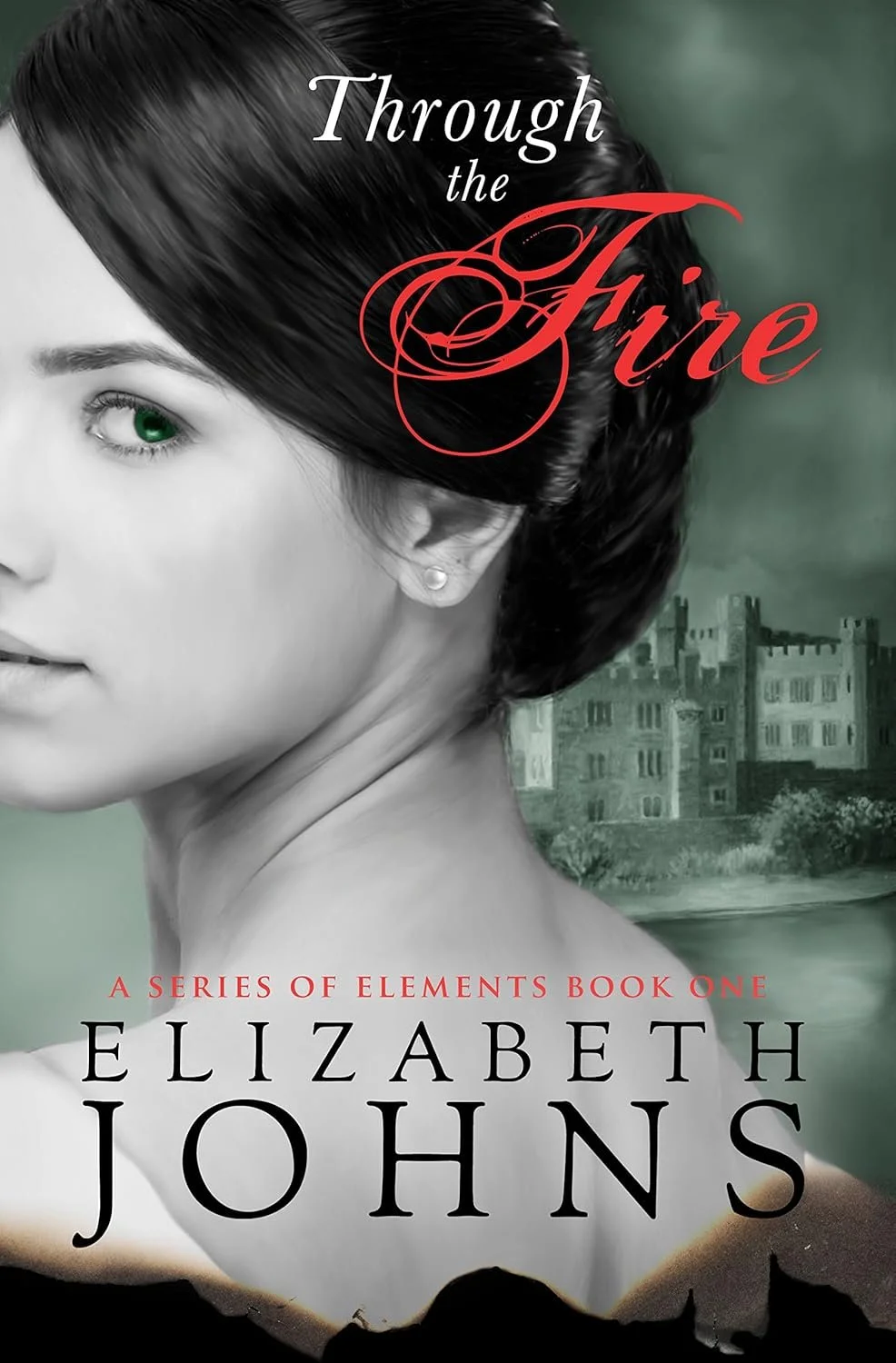 Book cover for 'Through the Fire' by Elizabeth Johns, featuring a young woman with black hair and green eyes, and a background of a castle or large house.