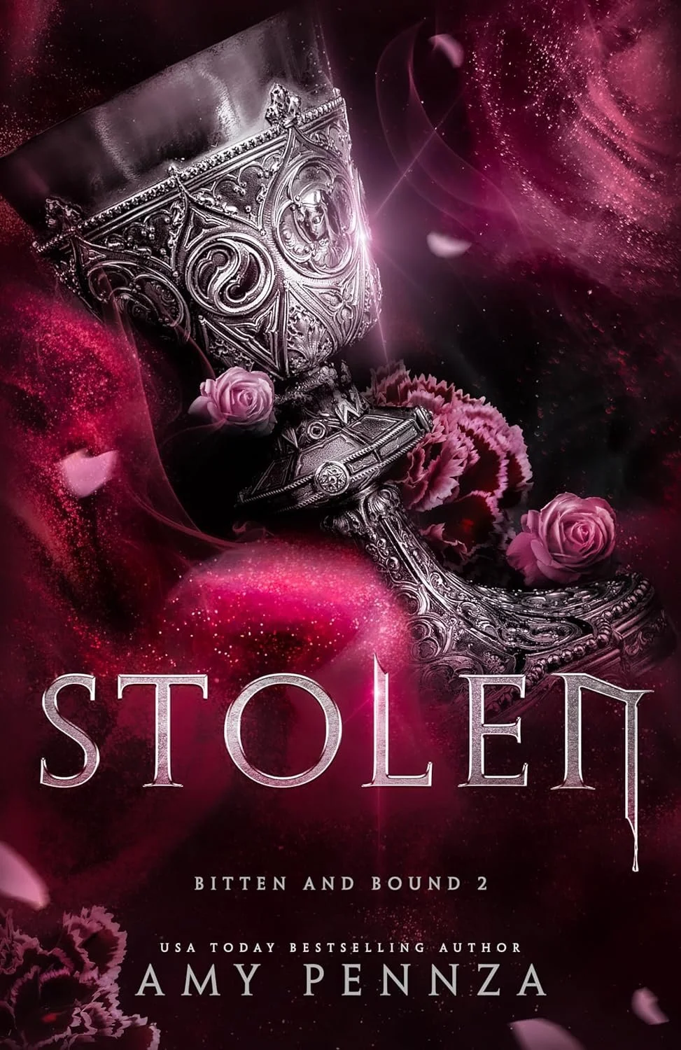 Book cover for "Stolen: Bitten and Bound 2" by Amy Pennza featuring an ornate silver goblet with pink roses and pink flower petals against a cosmic pink and black background.