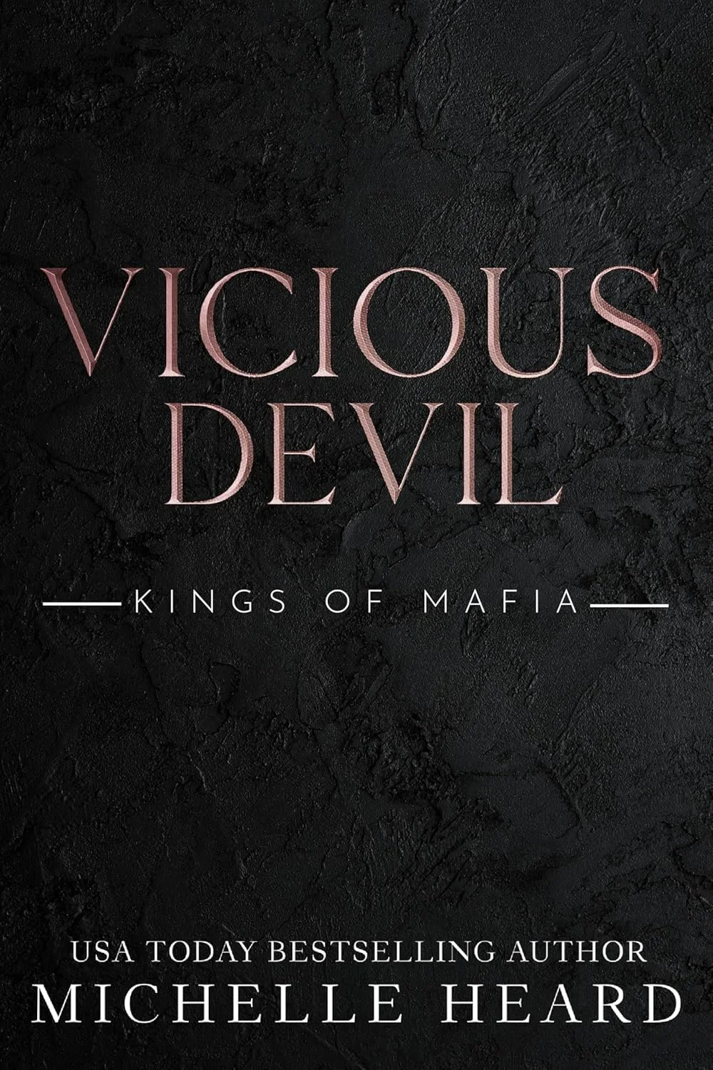 Book cover titled 'Vicious Devil: Kings of Mafia' by Michelle Heard, with a dark textured background and pinkish title text.