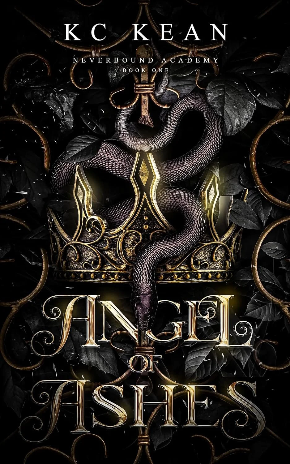 Book cover titled "Angel of Ashes" by K.C. Kean, featuring a black snake coiled around an ornate golden crown and surrounded by dark leaves and golden rings.