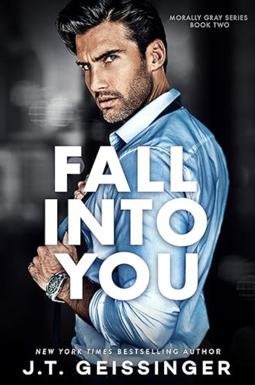 Cover of the book 'Fall into You' by J.T. Geissinger, featuring a Dark-haired man wearing a blue shirt, with an intense gaze on his face.  He has a 5p shadow, wearing a tie, watch and rolled up sleeves.   