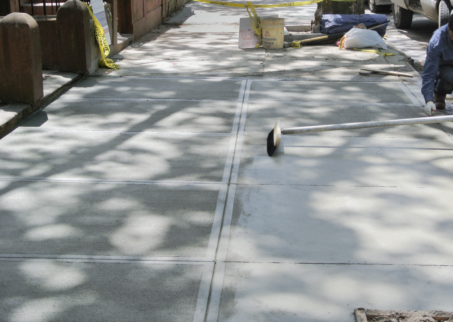 Completing sidewalk DOT violation removal project using Khan Home Improvement’s professional masonry services in Brooklyn.