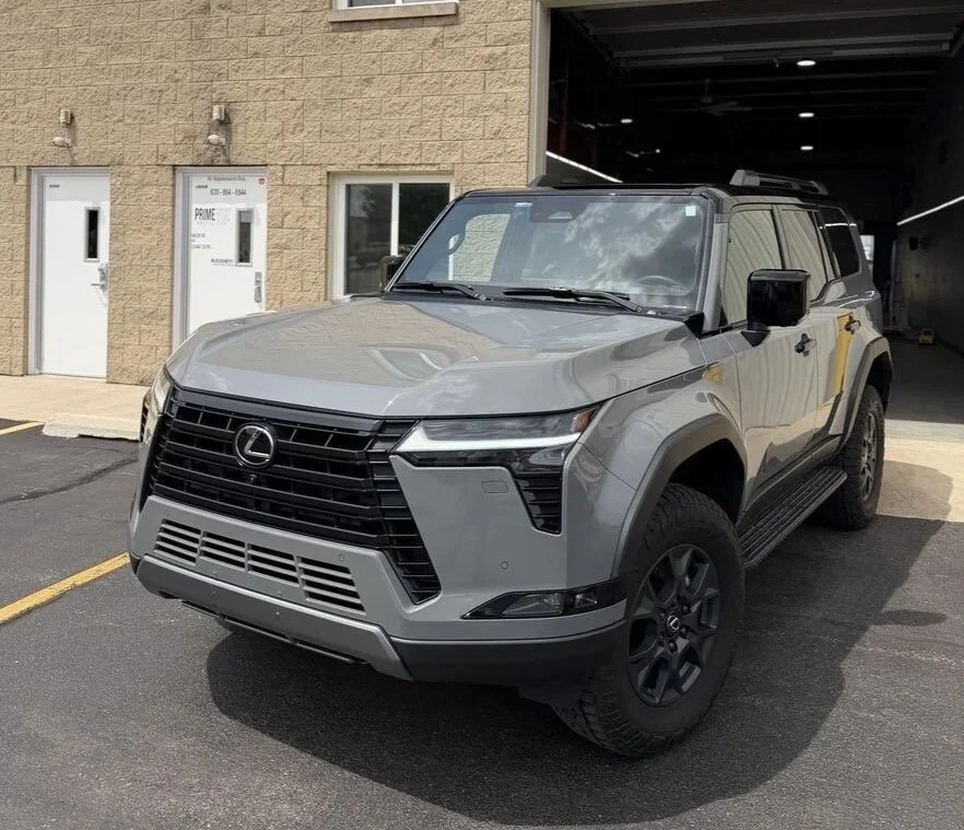 Gray Lexus GX SUV parked outside PrimeVue Protection after full front ppf and 5 year ceramic coating was installed.