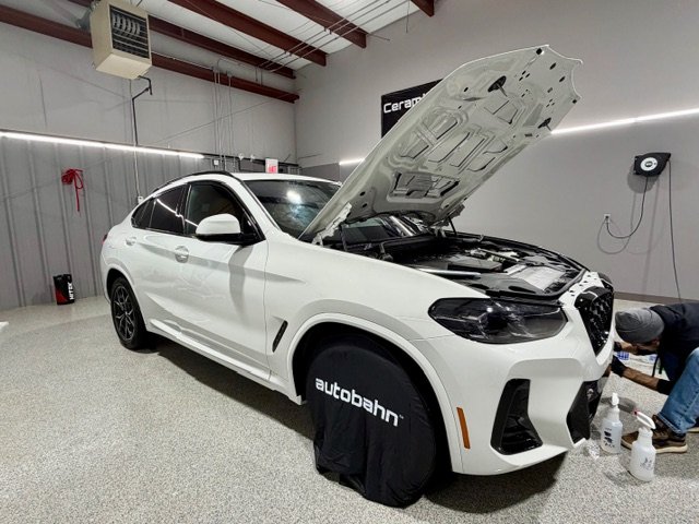 PrimeVue Protection specialist installing paint protection film on a BMW X4 in Plainfield, Illinois