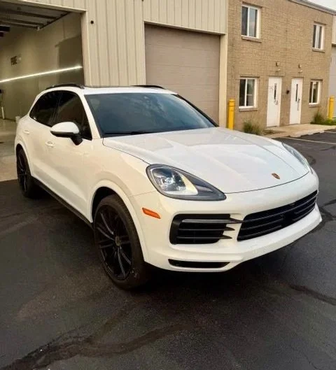 Porsche Cayenne getting windows tinted at PrimeVue Protection
