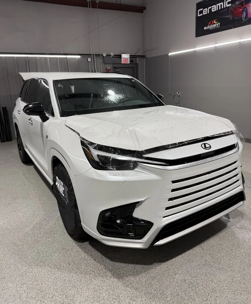 Lexus TX getting paint protection film, ceramic coating, ceramic window tints at PrimeVue Protection in Plainfield, IL