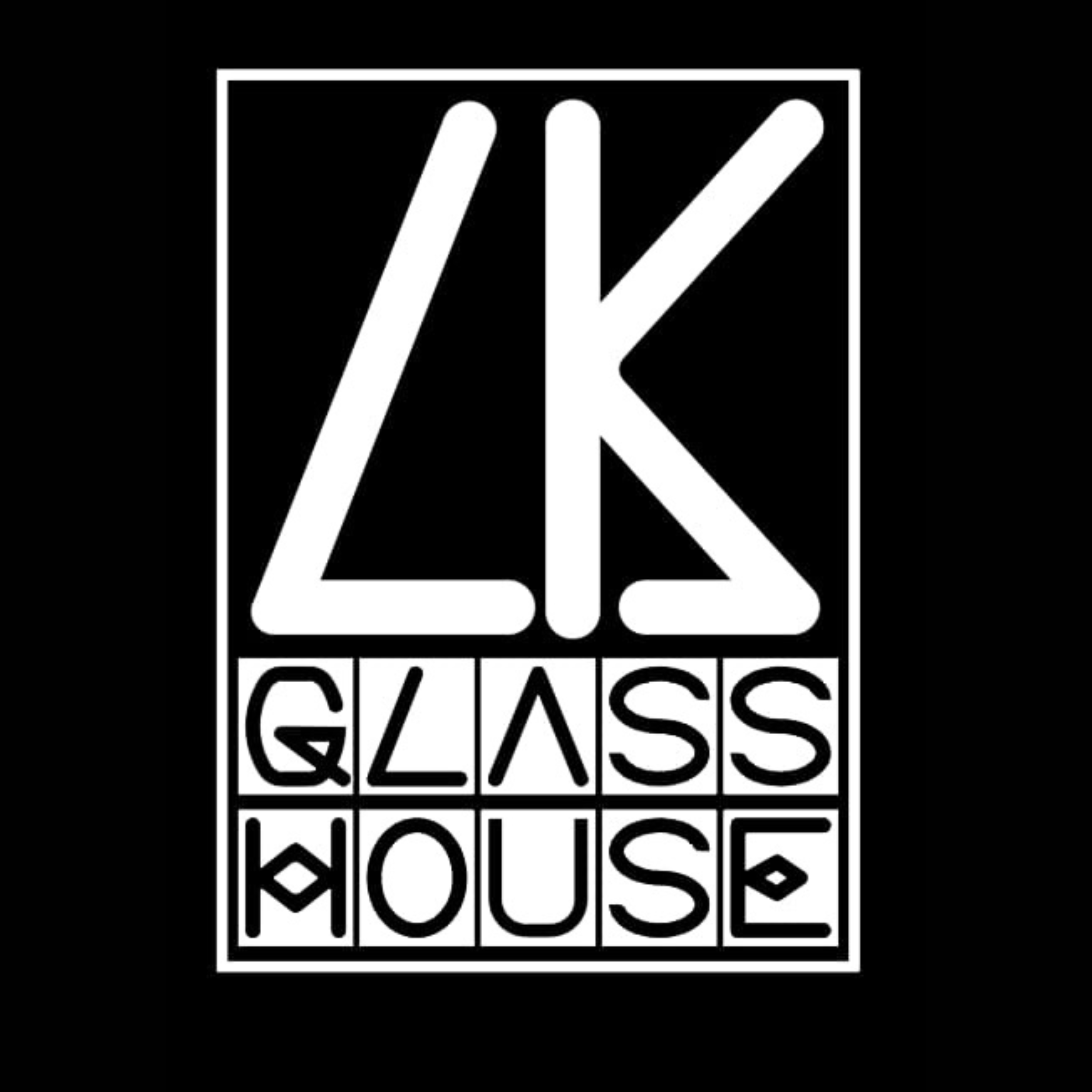 Black and white logo with stylized text reading 'Glass House' and the initials 'LK' at the top, enclosed in rectangular borders.