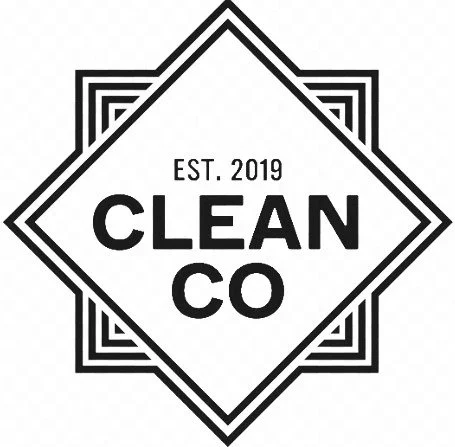 A black and white logo with a diamond shape, featuring the text 'EST. 2019 CLEAN CO' inside, surrounded by geometric border lines.