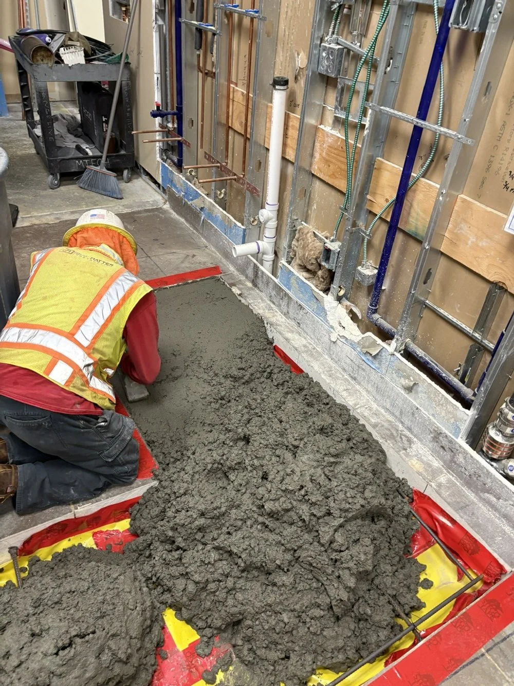 FH construction Group Project tradepartner performing concrete work