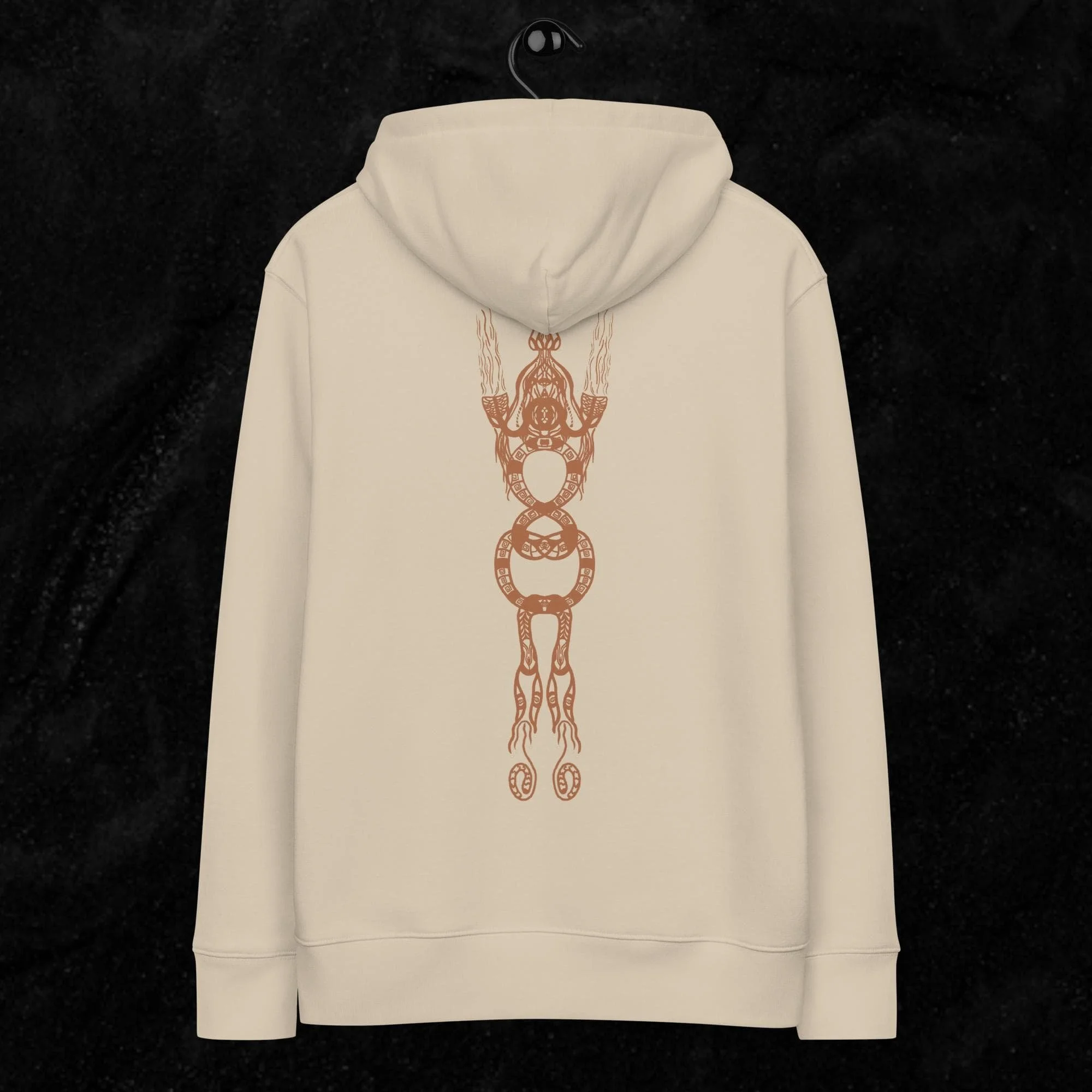 Sweat à capuche beige avec une illustration de style tribal de Verena Franzetti. Collection Shape Shifting