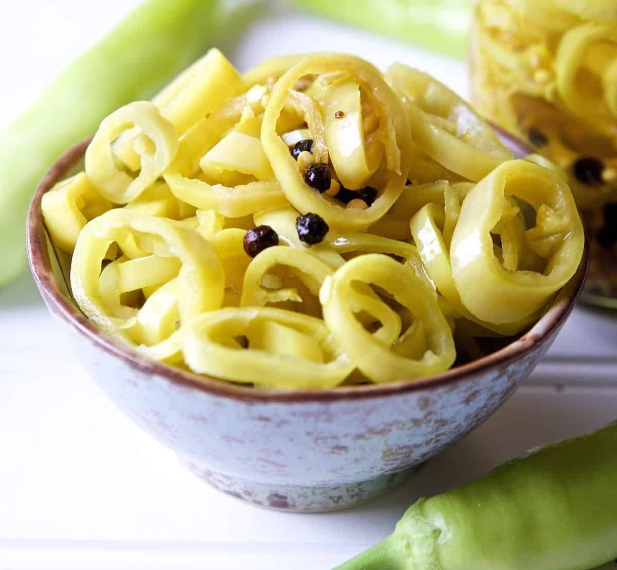 banana-peppers-pickled-with-spices-in-a-small-bowl..jpg