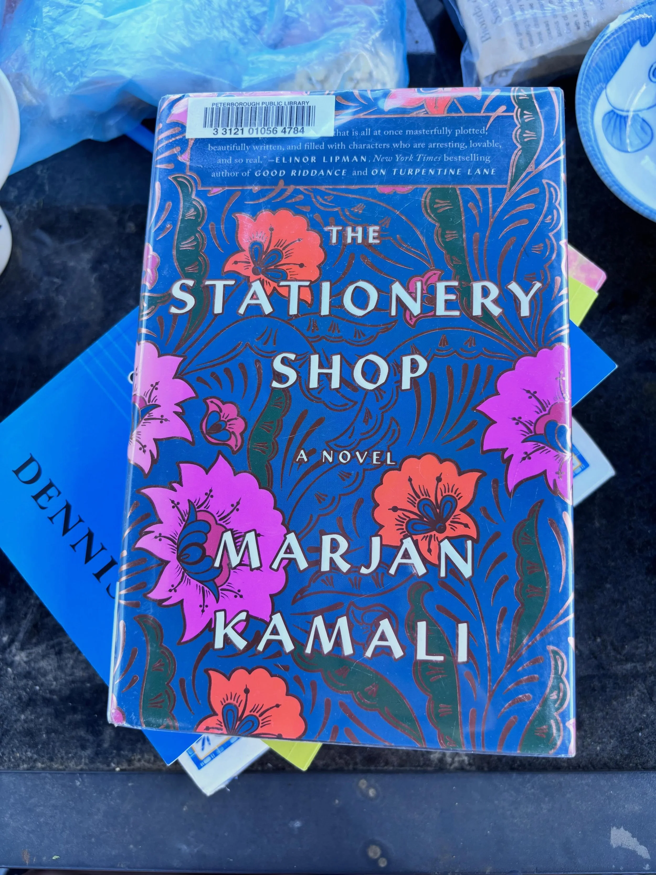 Books I&rsquo;m currently reading in no particular order, plus a picture of Lucy. (Actually 2 pictures of Lucy) 

1. The Stationery Shop: This book jumped out at me @ptbolibrary while I was casually making my way to the holds rack. I thoroughly enjoy
