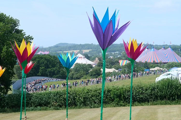 The view of Glastonbury festival from our glamping site at Festivue