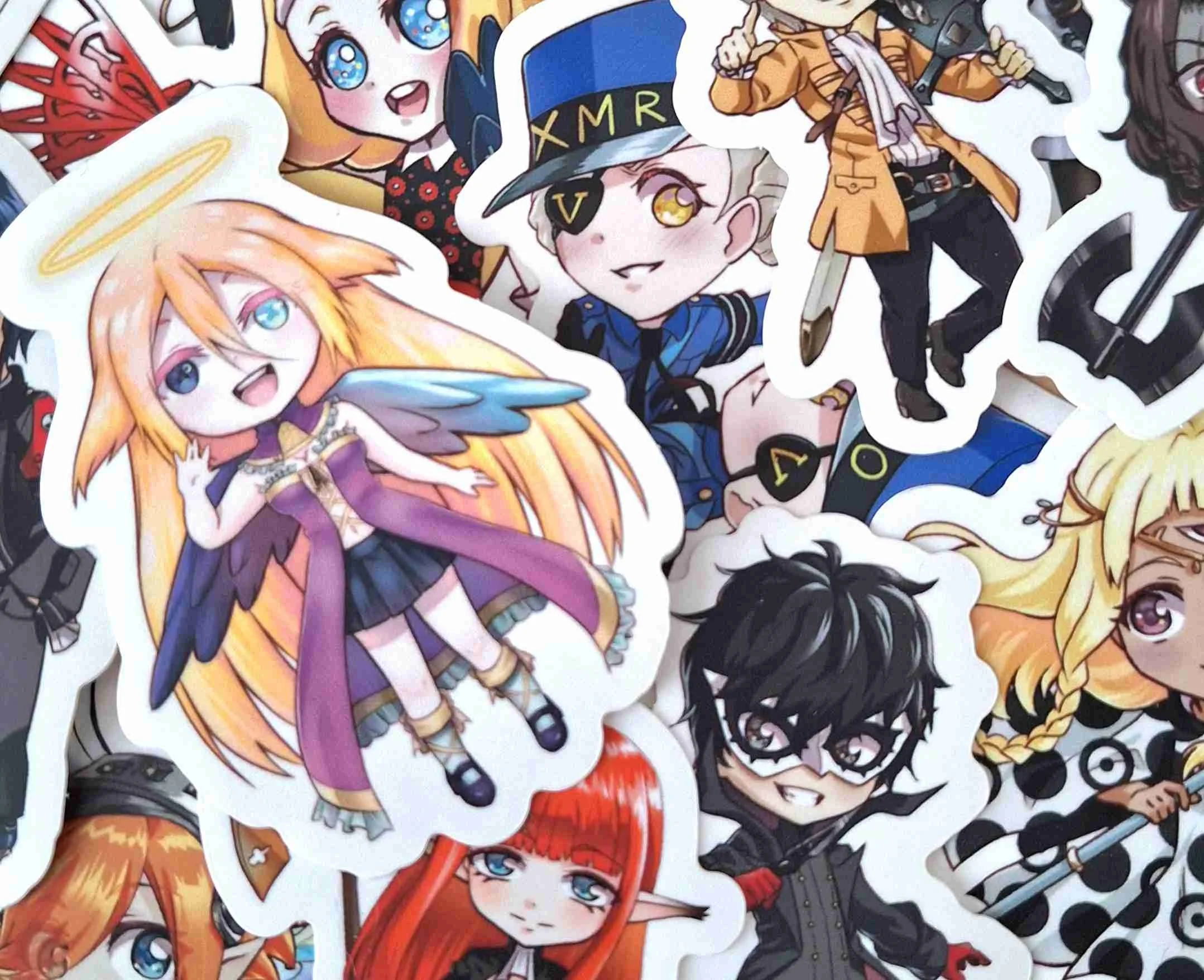 Close-up of multiple anime-style character stickers featuring characters with various hair colors and outfits, some with accessories and distinct facial expressions.